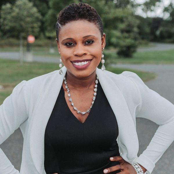 Michelle Gbelama-Okore smiling outdoors